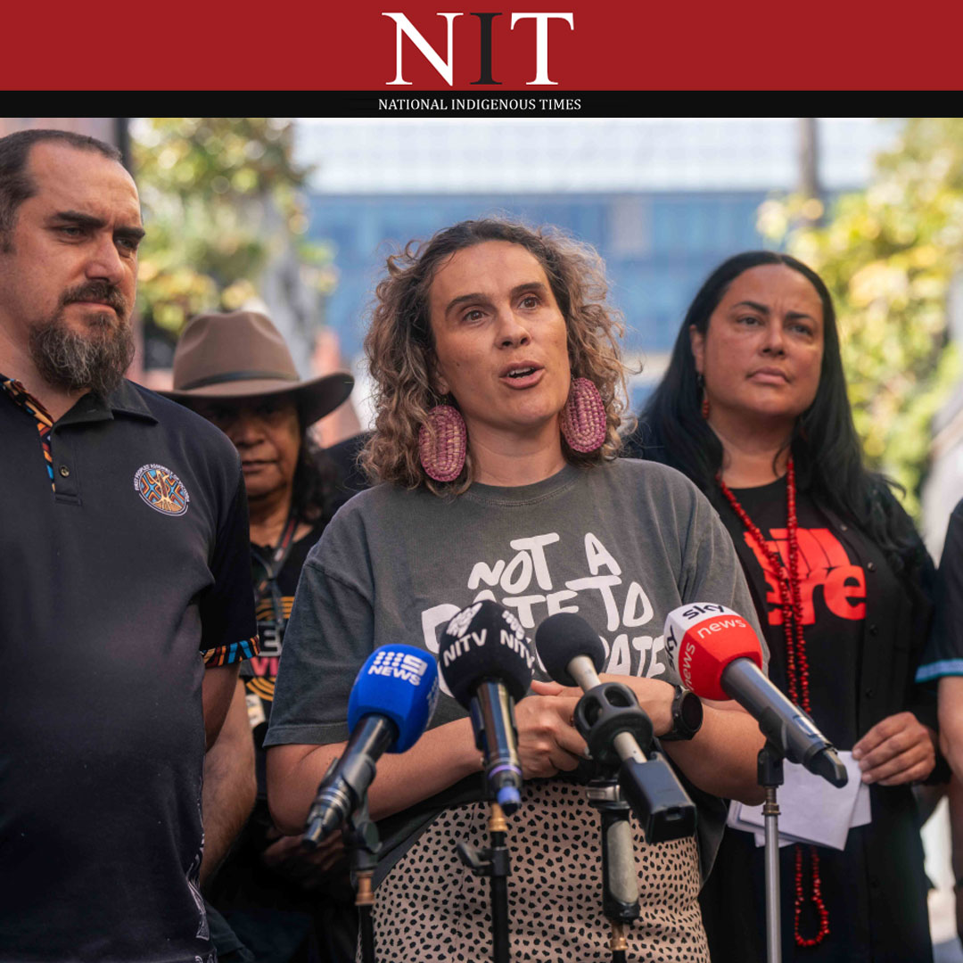 NIT logo: Picture of Assembly Members at press conference